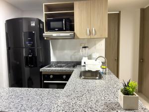 Comodo 2 cuartos AC y piscina