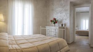 Luxury Quadruple Room with Sea View room in Relais La Pretura