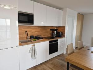 Appartements Le Nid Bleu : photos des chambres