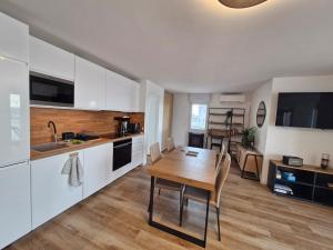 Appartements Le Nid Bleu : photos des chambres