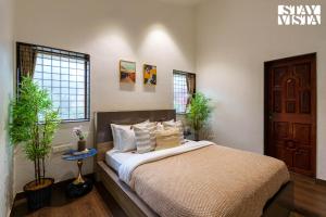 StayVista at Monte Blu with Views, Pool, Terrace