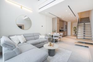 Chic Duplex 1BHK by CzechIn Luxe Stay with Pool Gym