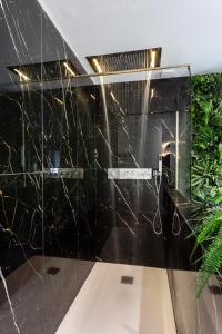Appartements La Suite Aimee - Espace relaxant avec balneo : photos des chambres