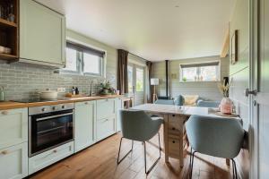 Boshuisje Luna | 4 personen - Vakantiepark De Kremmer