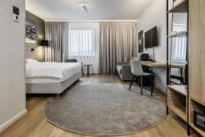 Family Room - Partial Airport View room in Park Inn by Radisson Vilnius Airport Hotel & Business Centre