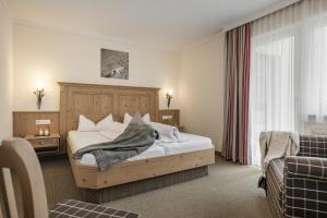Deluxe Double Room (2 Adults + 1 Child) room in Hotel Lenz