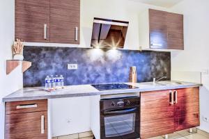 Appartements LE CHAMPETRE I Cozy & Family I Gare & Parking I RENT IMMO : photos des chambres