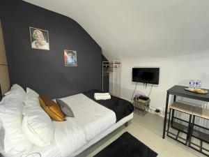 Appartements L-icone du cinema Evreux - gare - centre : photos des chambres