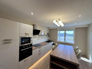 Appartements AMMG Tour Marina – Suites Signature | Vue Mer Panoramique, Jacuzzi & Design : photos des chambres