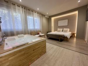 Appartements AMMG Tour Marina – Suites Signature | Vue Mer Panoramique, Jacuzzi & Design : photos des chambres