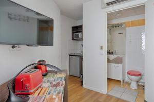 Appartements Escapade entre Ville et Riviere : photos des chambres