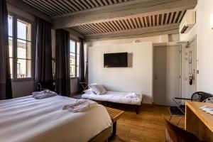 Hotels Boutique Hotel Entraigues : photos des chambres