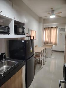 2BR Condo SMDC Charm Metro Manila - Aparthotels, Manila