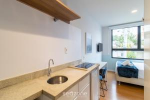 Studio moderno a poucos minutos da Praia – SID0209