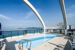 SHB - Beachfront: Varanda, Piscina e Por do Sol
