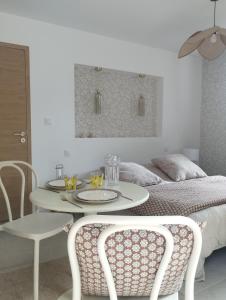 Maisons d'hotes Studio dans Maison Familiale : photos des chambres