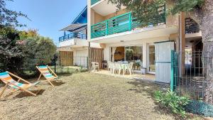 Appartements V-Mimosas 02 Appartement lumineux pour 6 personnes avec terrasse et jardin a Vieux Boucau : photos des chambres