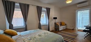 Riva Residence in Old Town Ljubljana by the Cobblers' Bridge 