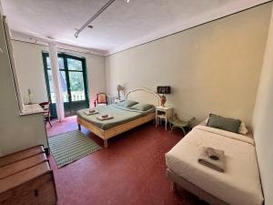 B&B / Chambres d'hotes Villa Magdala Arts & Residence : photos des chambres