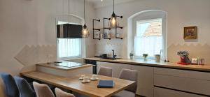 Riva Residence in Old Town Ljubljana by the Cobblers Bridge