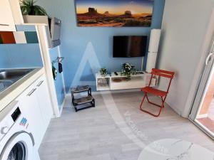 T2 avec loggia vue piscine, ascenseur et place de parking