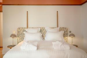 Hotels Le Petit Hotel : photos des chambres