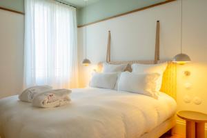 Hotels Le Petit Hotel : photos des chambres