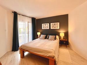 Appartements Charmant 2 pieces dans villa : photos des chambres