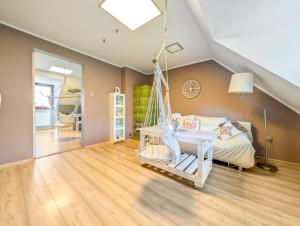 Swing & Serenity Apartment by BookingHost