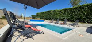 Maisons de vacances Broceliande calme breton, spa, wifi, amazon-disney tv, 4 lits, Freebox revolution,draps, cafe, the : photos des chambres