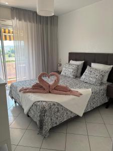 Appartements 3 pieces Antibes, clim, vue mer, piscine et parc : photos des chambres