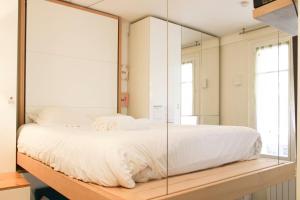 Appartements Charming bright studio in Clichy : photos des chambres
