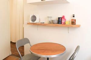 Appartements Charming bright studio in Clichy : photos des chambres