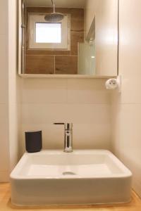 Appartements Charming bright studio in Clichy : photos des chambres