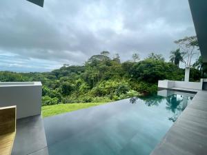 New! Modern-luxury-3 Suites-pool-ojochal-100mbps