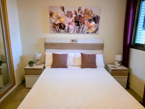 Elegante Apartamento con Terraza, Piscina, Garaje, Playa