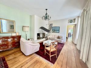 Maisons de vacances La Maison de la Glycine - Situee en plein coeur de ville : photos des chambres