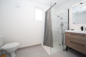 Appartements Studio Nymphaea par Chelona-Loc - 1 personne - terrasse et parking : photos des chambres