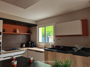 Maisons de vacances Chez Caco maison lumineuse avec jardin proche du Puy duFou : photos des chambres