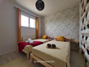 Maisons de vacances Chez Caco maison lumineuse avec jardin proche du Puy duFou : photos des chambres