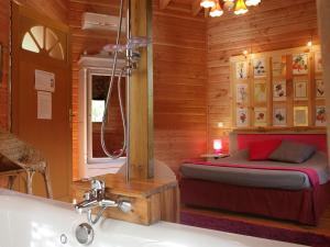 Chalets le refuge des pots rouges : photos des chambres