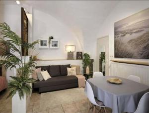Appartements Cote Jardin - Studio voute by PRIM0 C0NCIERGERIE : photos des chambres