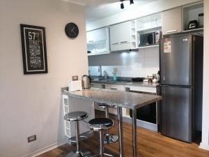 Exclusivo departamento a pasos del centro