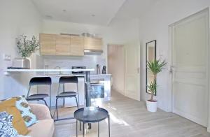 Appartements T2 avec terrasse en rdc de maison de ville : photos des chambres