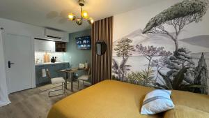 Appartements Exotic Garden - Studio cosy hypercentre Auxerre : photos des chambres