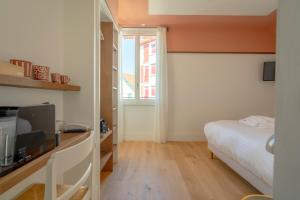 Hotels Le Petit Hotel : photos des chambres