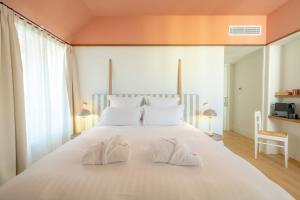 Hotels Le Petit Hotel : photos des chambres