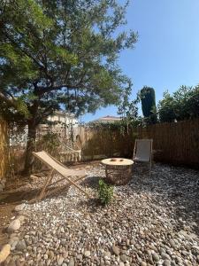 Appartements Appartement cosy avec jardin et parking : photos des chambres
