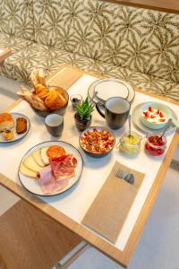 Hotels Le Petit Hotel : photos des chambres