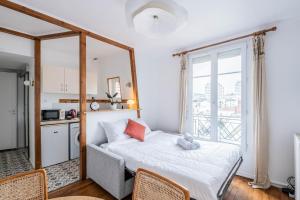 Appartements A 3 min metro & shopping, aux portes de Paris : photos des chambres